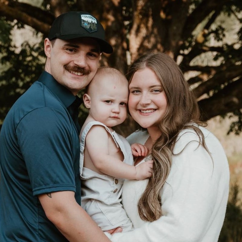 Kyli, Dental Assistant, with her husband and son